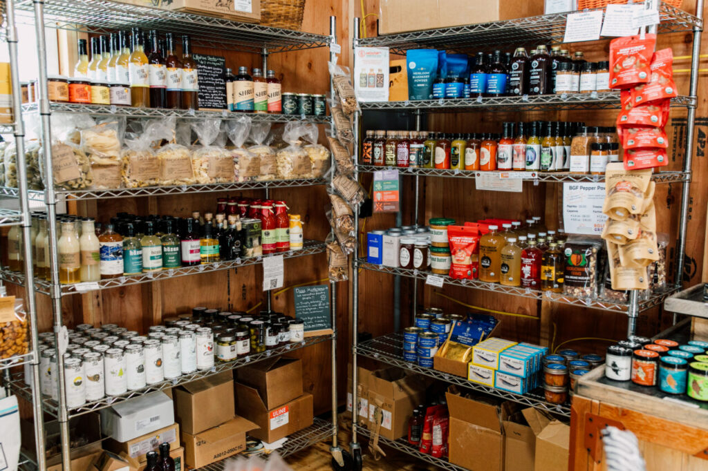 Shelves of products at the Boldly Grown Farm farm stand